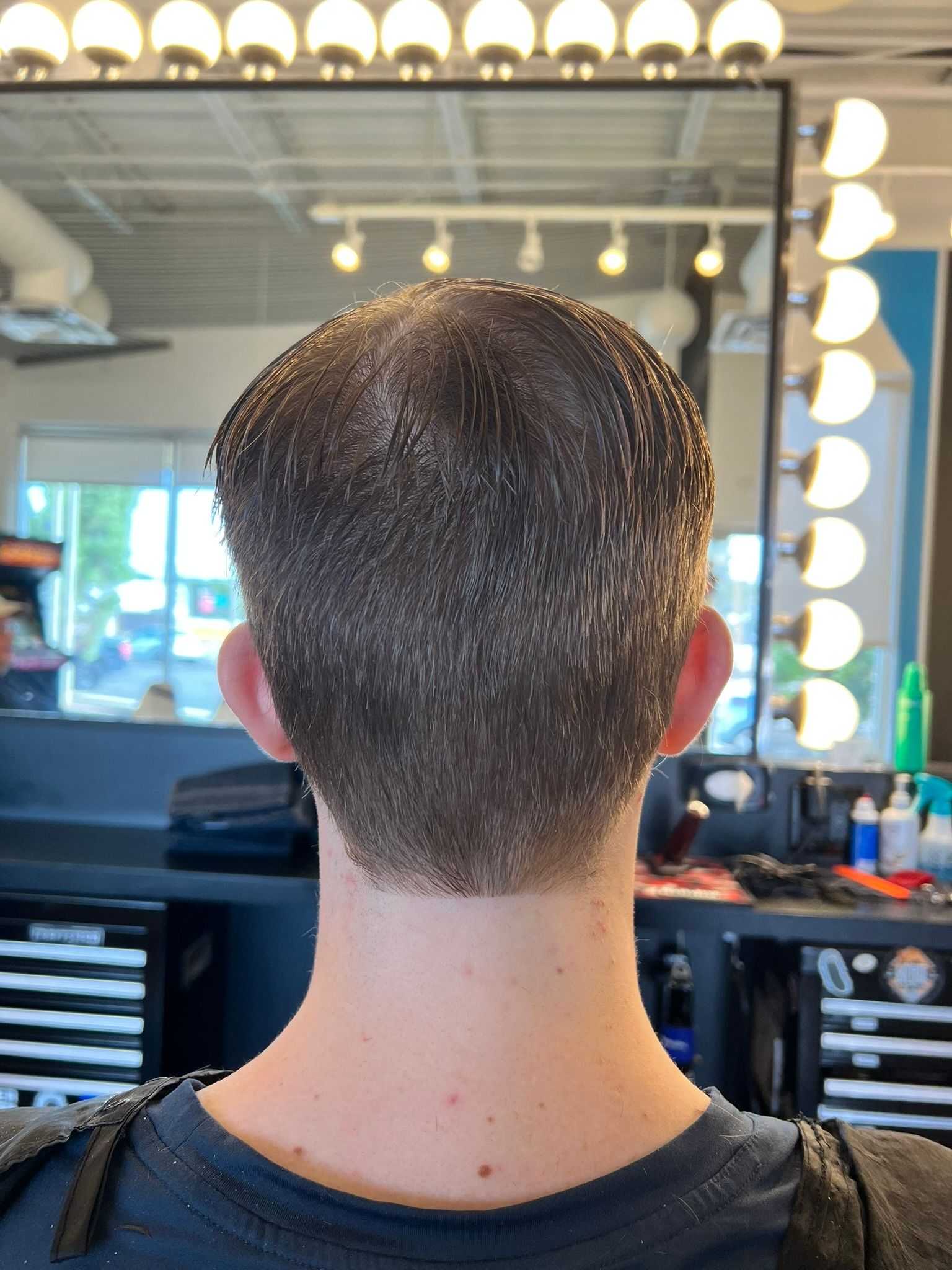 Classic short dark taper with a clean neckline