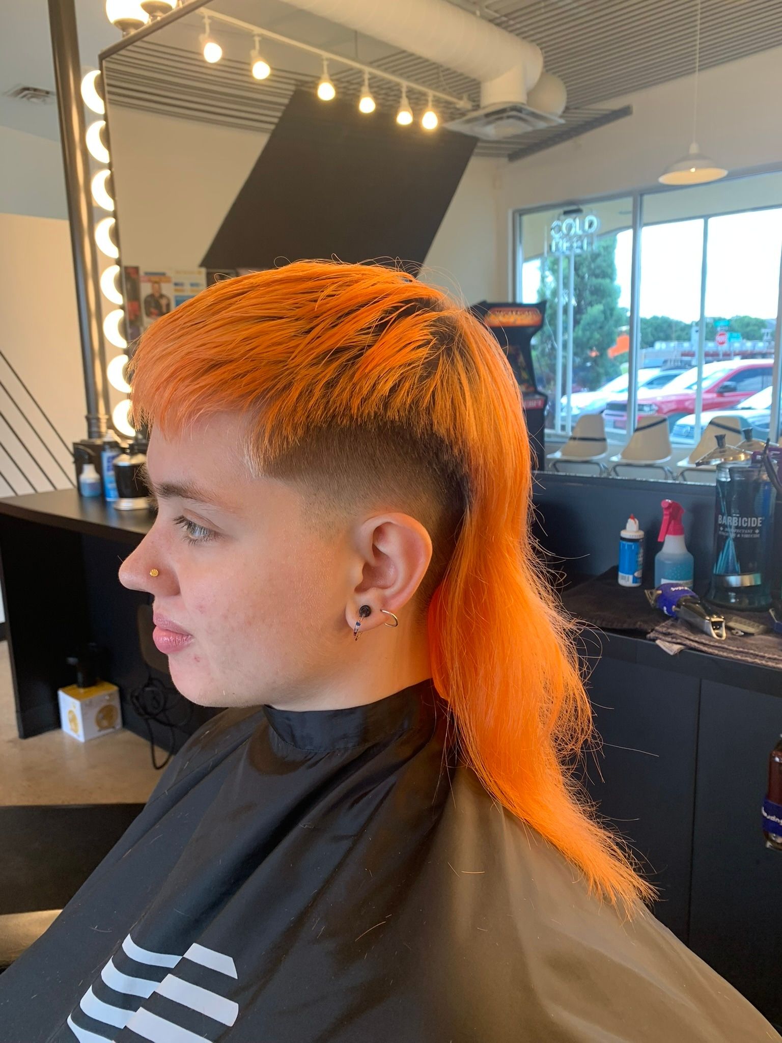 Vivid orange mullet with closely tapered sides and a long textured back